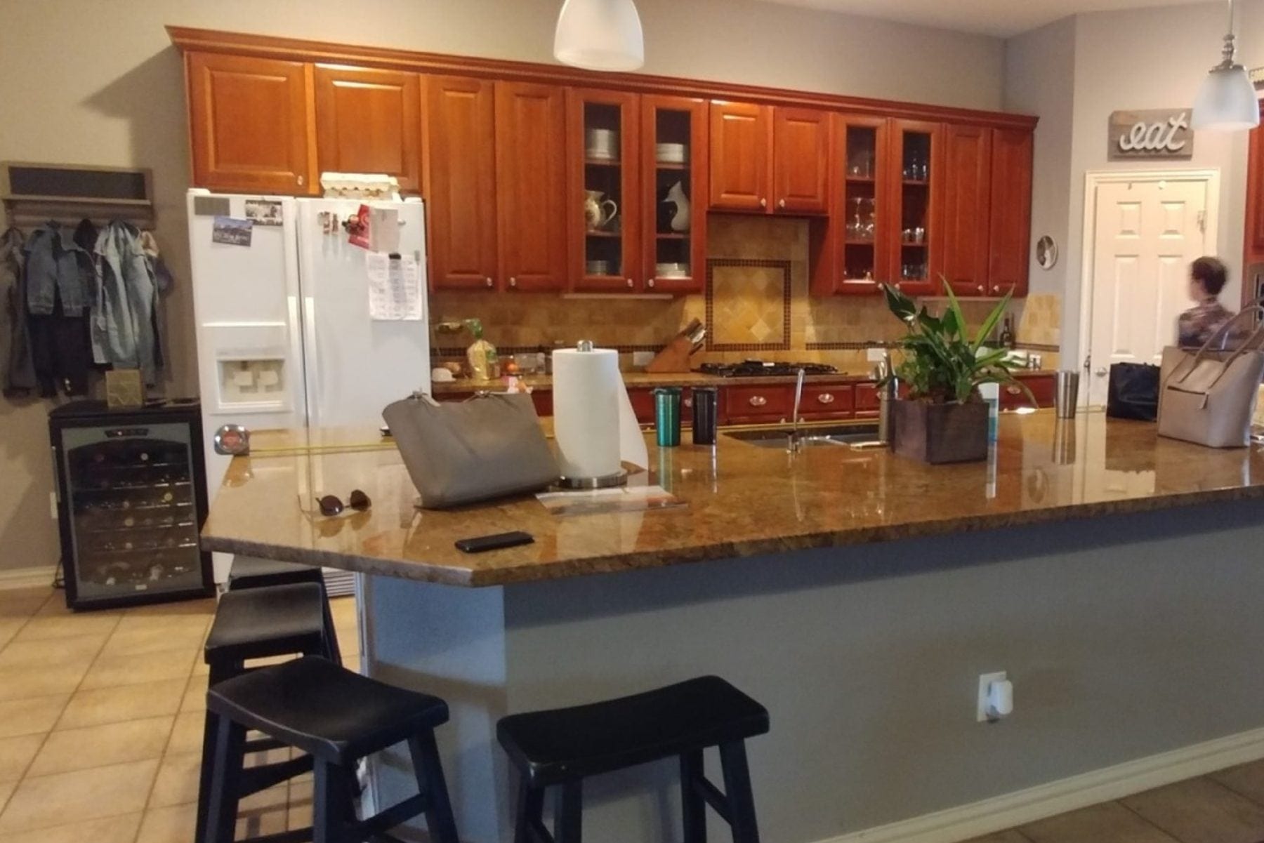 The Owner wanted to change the cabinets, floors,  back-splash, and countertops