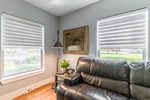 Dallas Remodeled Living Room with Hunter Douglas Pirouette Window Shadings half-Lowered in Greenway Parks, TX ,75209