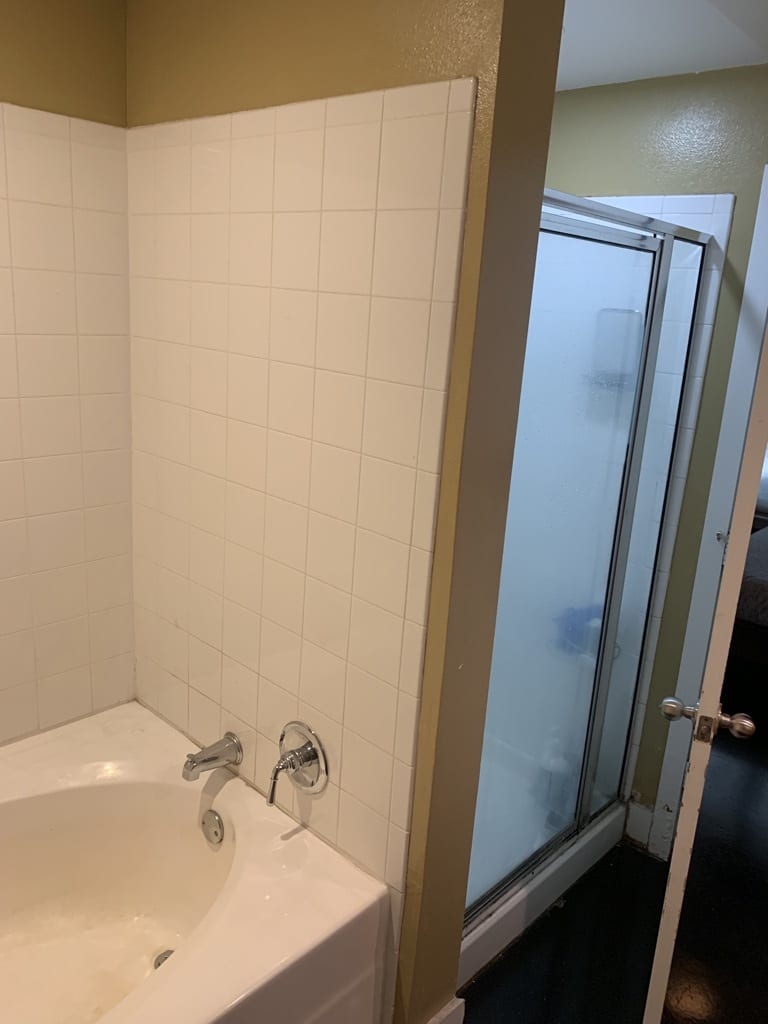 Shower-Before-Mid-Rise-Bathroom-Remodel Mid-Rise Westside Condo Bathroom Remodel
