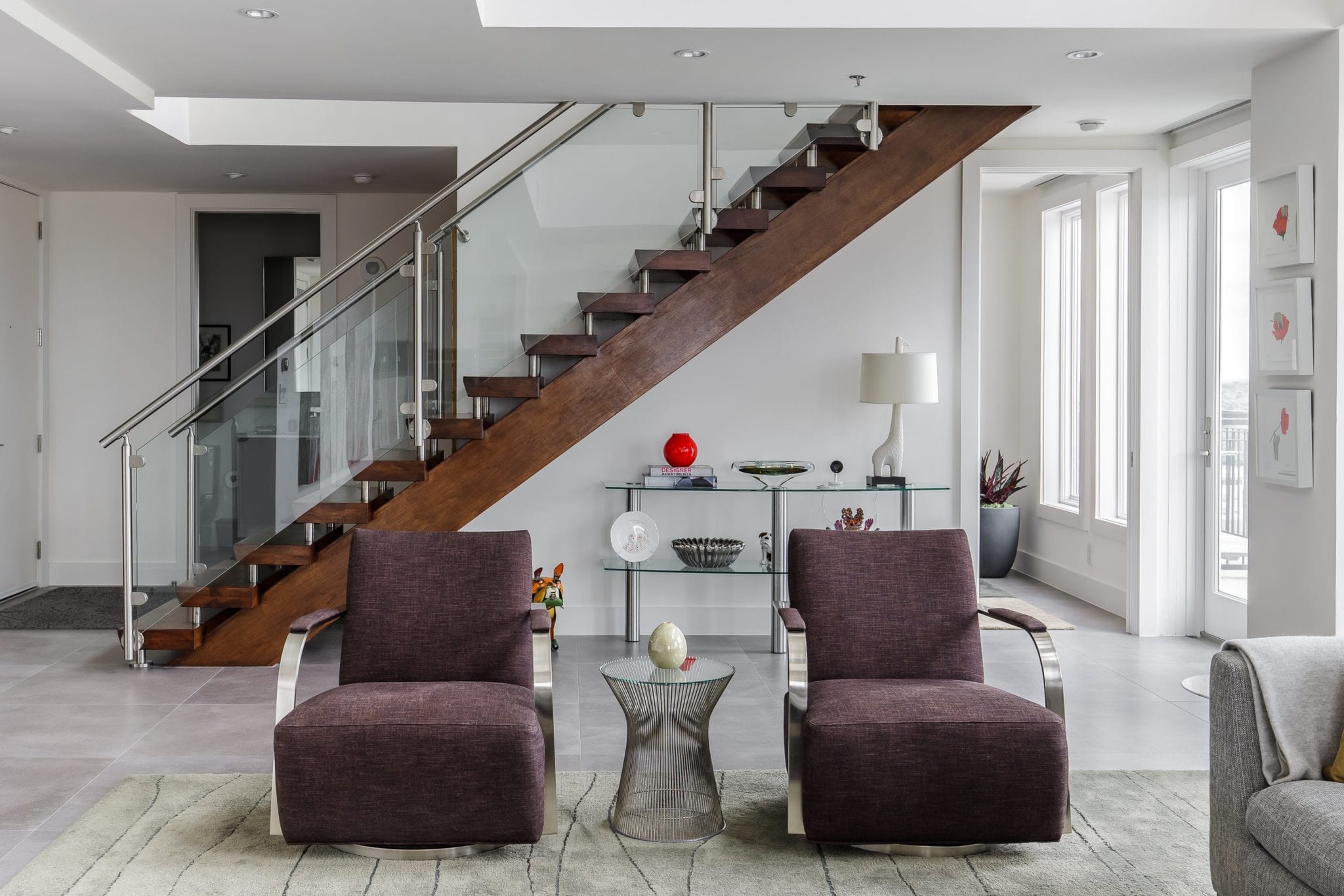Renowned-Renovation-Penthouse-Remodel-Stairs-Living-Room-Dallas-75205 (1) Two Story High Rise Lower Level