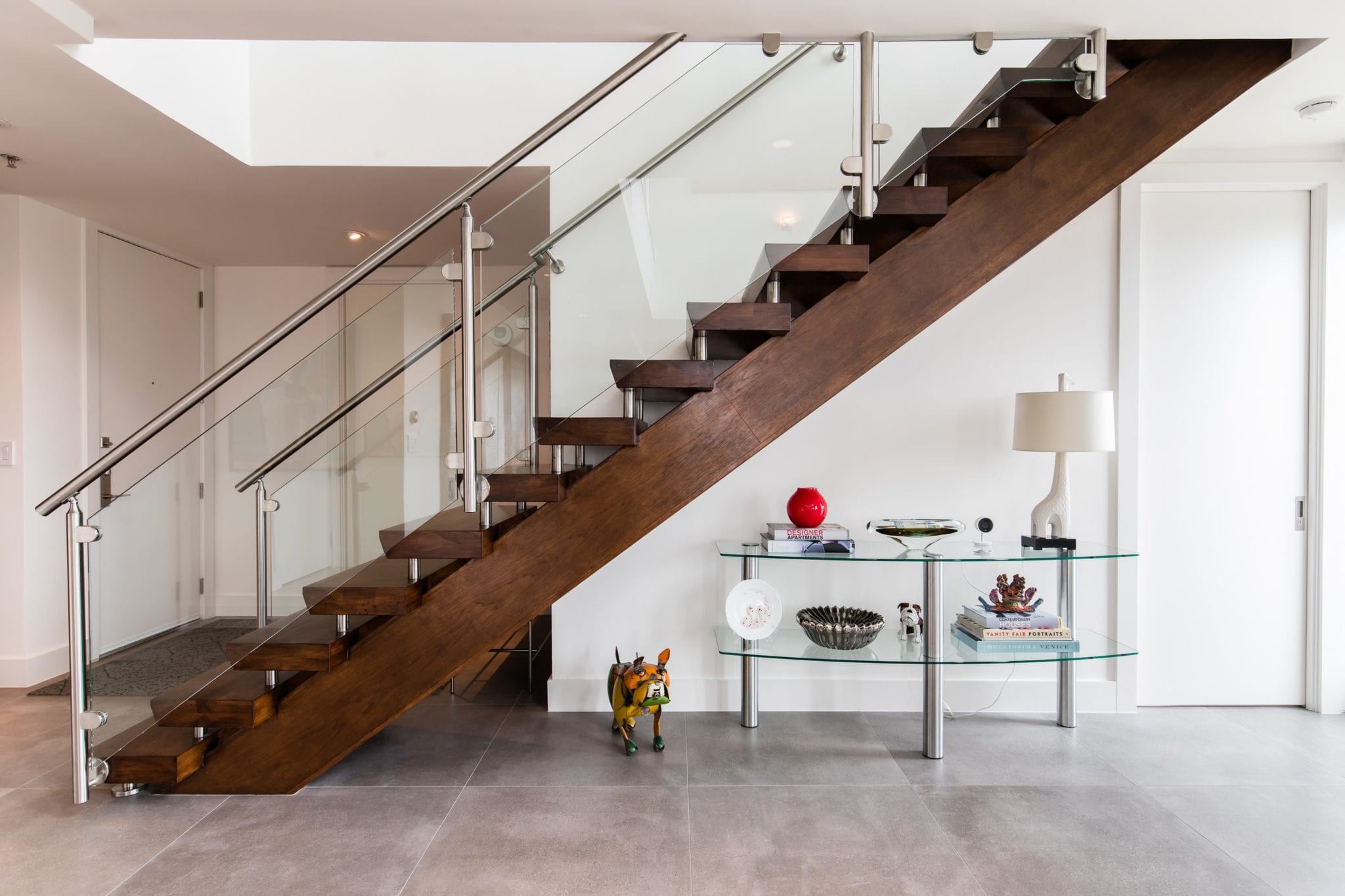 Renowned-Renovation-Penthouse-Remodel-Stairs-Living-Room-Dallas-75205 Two Story High Rise Remodel