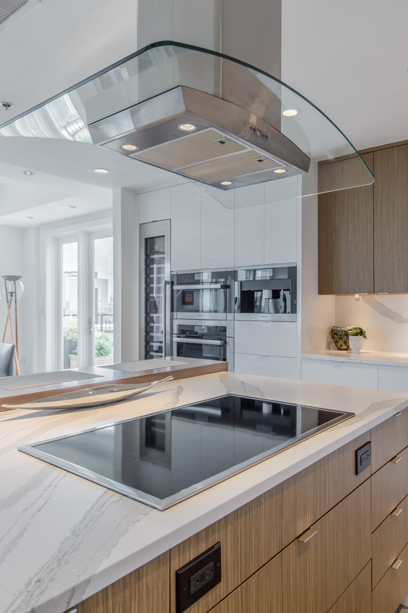 Renowned-Renovation-Penthouse-Kitchen-Remodel-Custom-Cabinets-Miele-Appliances-Cambria-Countertop-Kohler-Fixtures-Dallas-75205 (1) Penthouse Kitchen Island