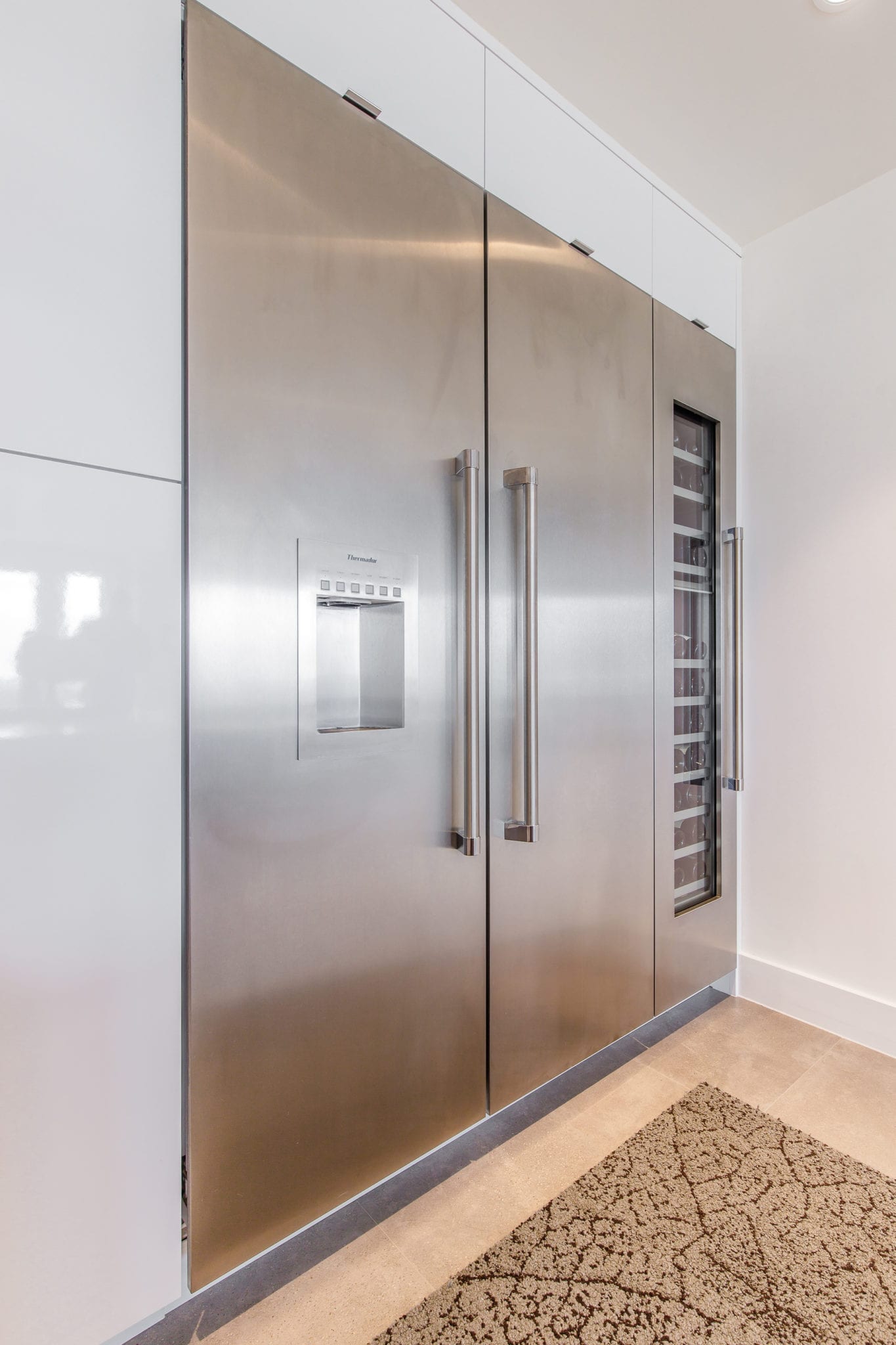 Renowned-Renovation-Penthouse-Kitchen-Remodel-Custom-Cabinets-Miele-Appliances-Cambria-Countertop-Kohler-Fixtures-Dallas-75205 (2) Penthouse Kitchen Thermador Refrigerator