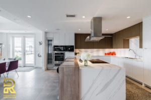 Kitchen Island in Dallas TX Penthouse After Remodeling by Renowned Renovation in The Travis at Katy Trail
