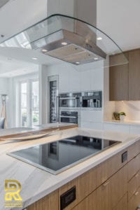 Kitchen Island in Dallas TX Penthouse After Remodeling by Renowned Renovation in The Travis at Katy Trail