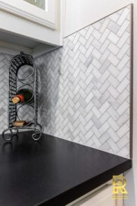 Wet Bar with Wine Rack in Highpark TX Single Family Home after Remodeling by Renowned Renovation