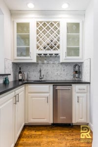 Wet Bar with Wine Rack in Highpark TX Single Family Home after Remodeling by Renowned Renovation