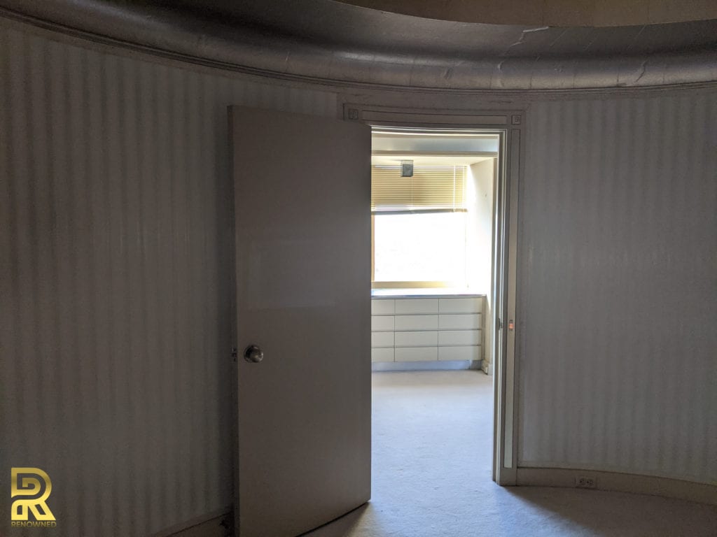 Luxury-Penthouse-Encloded-Master-Bedroom-Before-Remodeling- Round Master Bedroom Door