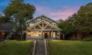 Luxurious 4,200 SF Craftsman Home in East Dallas by The Renowned Group, showcasing elegant design and lush landscaping