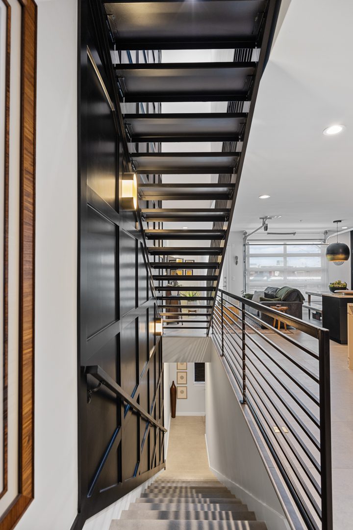 Main level stairs after Conversionn of a Downtown Dallas Condo by Renowned Group