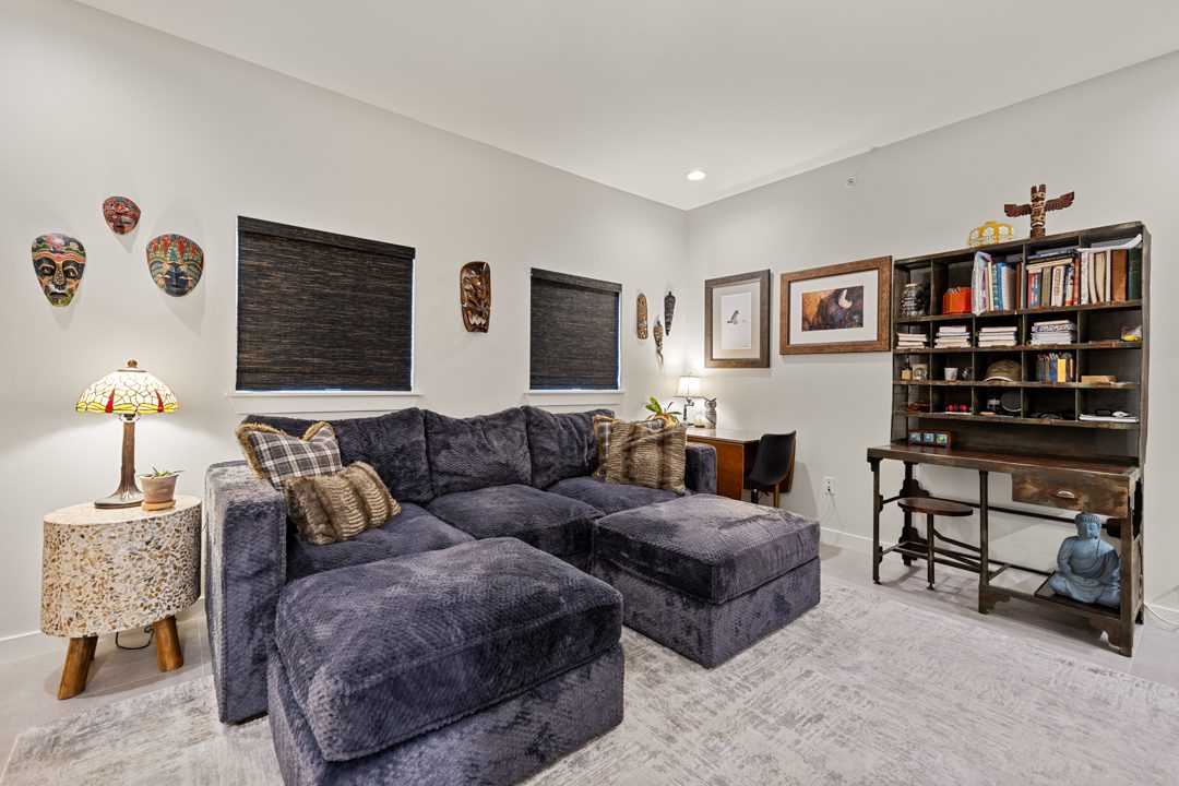 TV Room after Conversionn of a Downtown Dallas Condo by Renowned Group 2