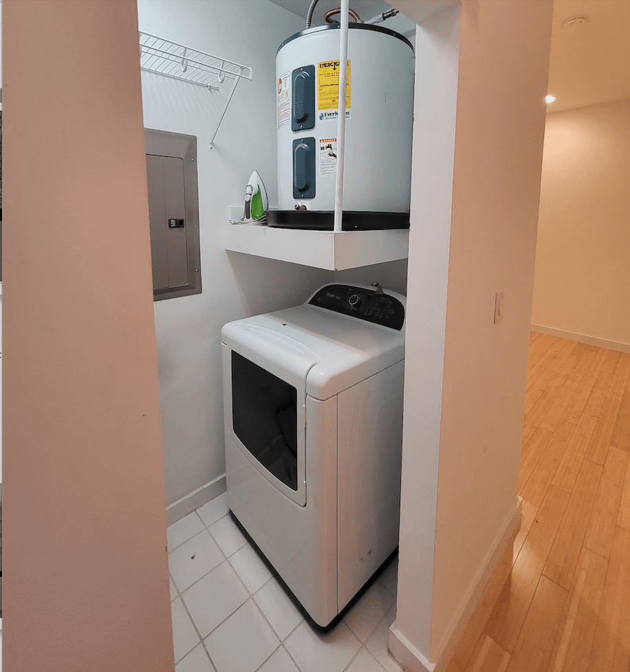 dallas condo laundry room before remodel dated appliances tile floor