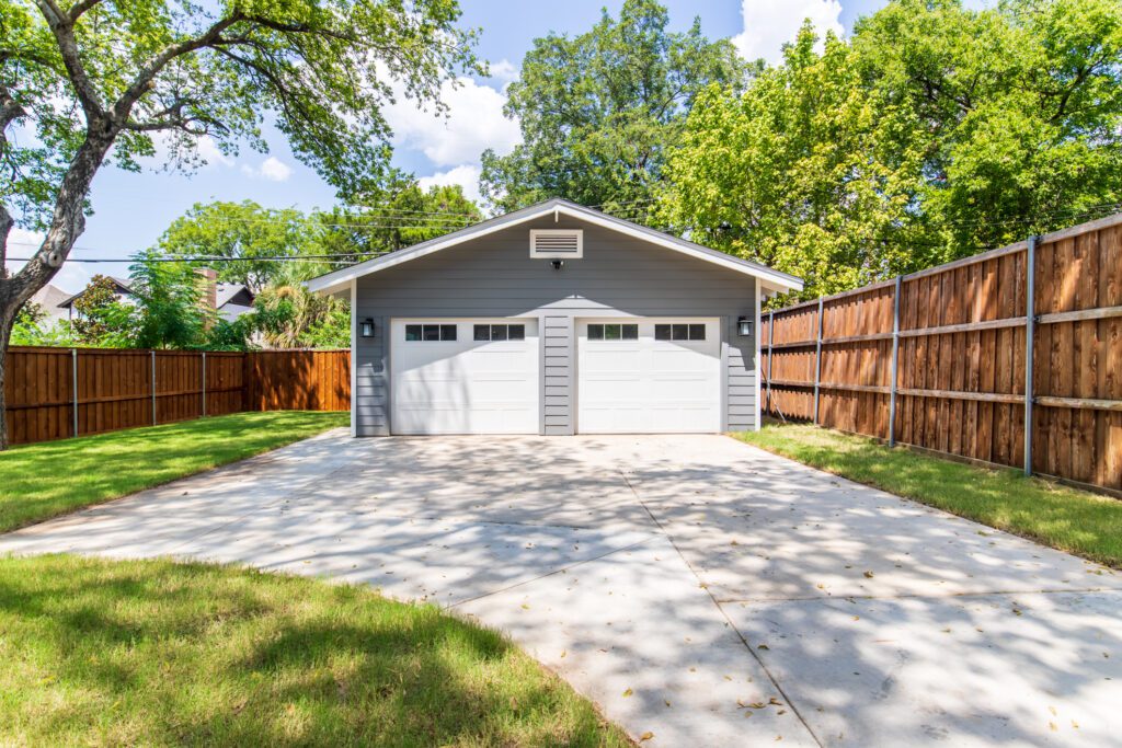Renowned Group Dallas Custom Home Garage Driveway Exterior
